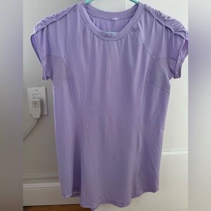 NWOT Lavender Lululemon Teeshirt with pocket and cut out details